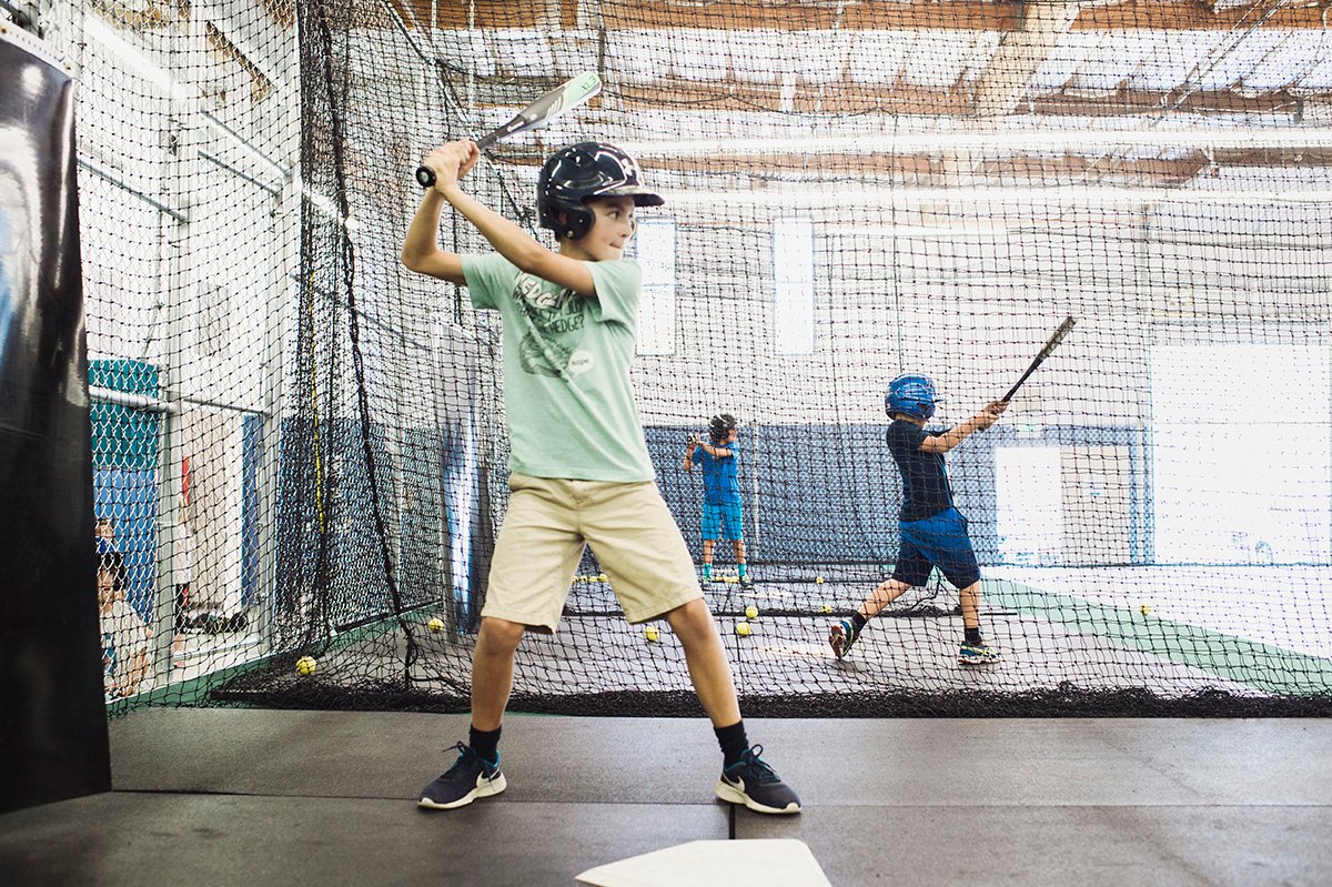 young sirious students taking their &nbsp;swings in the sirious cages.